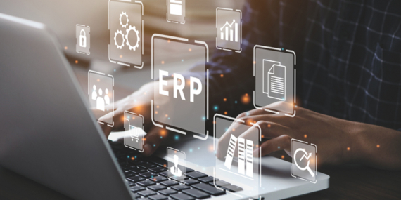 Businessman using a computer to document management for ERP. Enterprise resource planning concept.